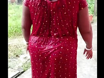 Big-titted Chinese hottie DasX R gets drenched in the rain while flashing off her gorged finances