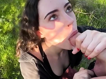 Impressive busty brunette slut doing blowjob outdoor